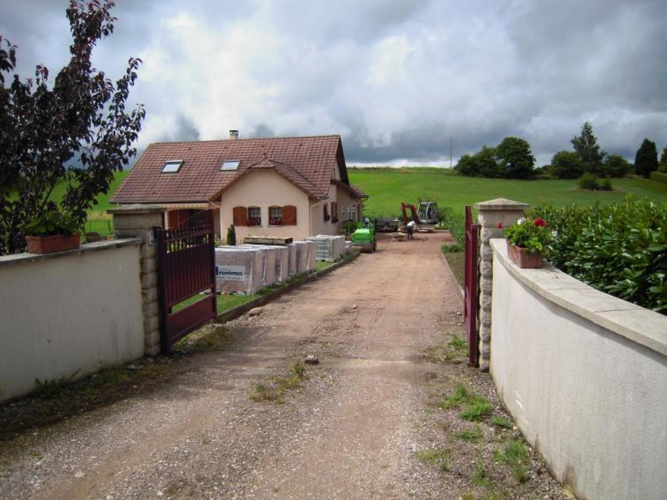 Réalisation d'une allée pavée près d'Épinal